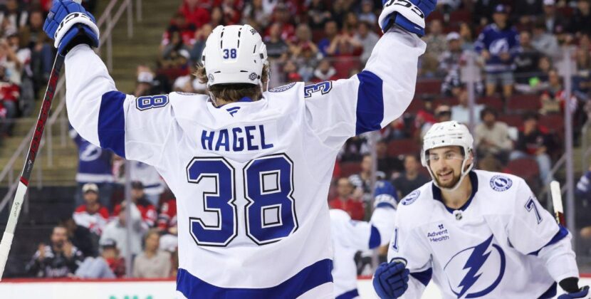 Brandon Hagel scores a natural hat trick as the Tampa Bay Lightning defeat the New Jersey Devils 8-5 in a high-scoring matchup.