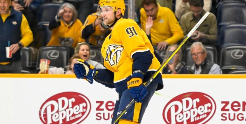 Nashville Predators General Manager Barry Trotz faces pressure to find a reliable number two center as the team's early-season struggles continue, with a two-year window to turn their fortunes around.